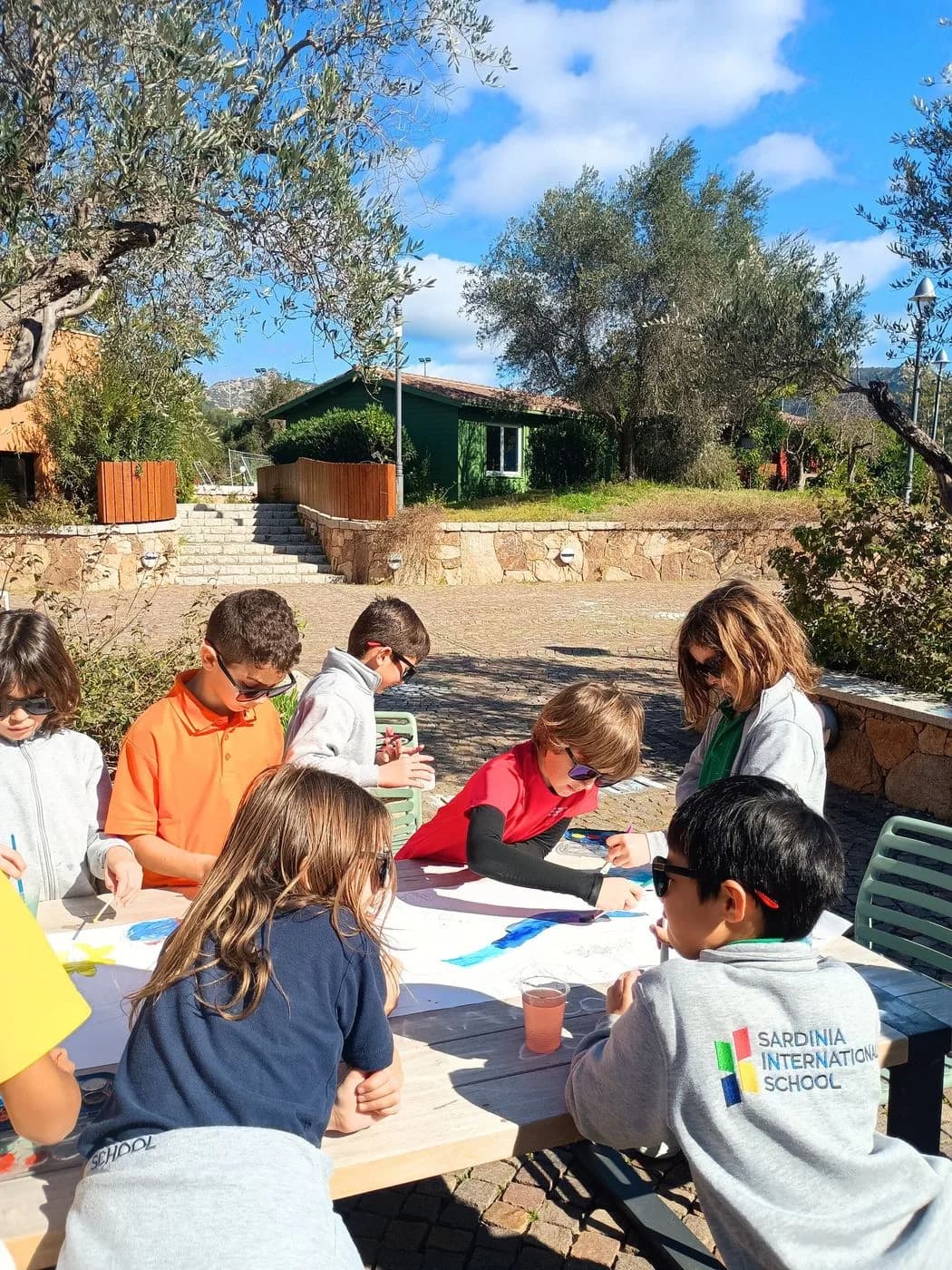 Pupils at the outdoor classroom table